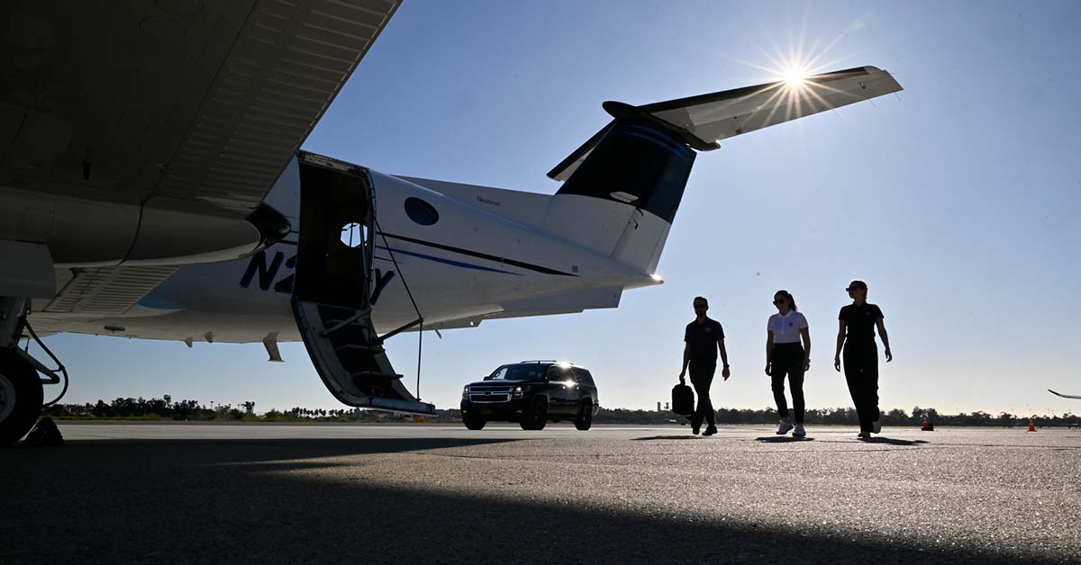Charter passengers boarding King Air 350